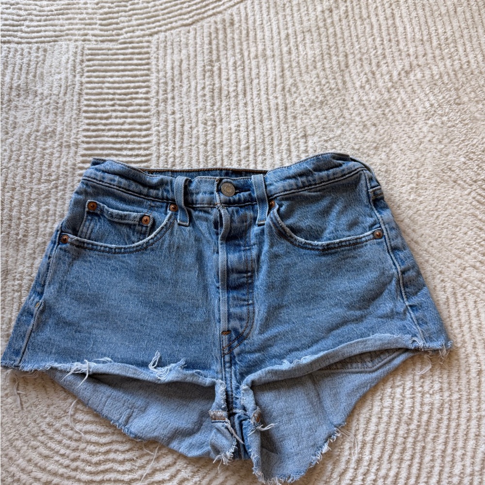 Vintage style Levi's Light Blue Distressed High-Rise Denim Shorts
